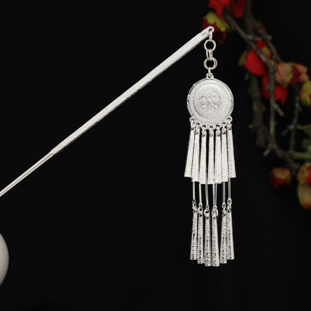 Boho vintage ethnic silver-tone hair stick featuring detailed textured handle, intricate chain network decor, and layered silver tassel pendants, displayed against a black background with red floral accents, ideal for bohemian and traditional fashion enthusiasts in the US 06