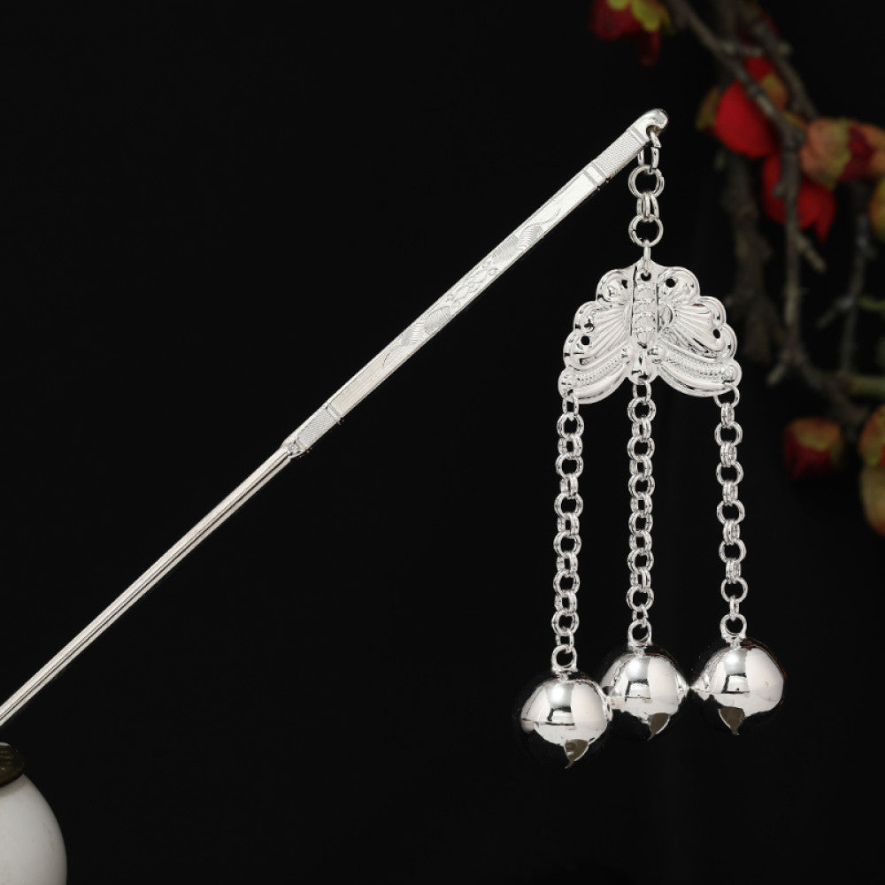 Boho vintage ethnic silver-tone hair stick featuring detailed textured handle, intricate chain network decor, and layered silver tassel pendants, displayed against a black background with red floral accents 17