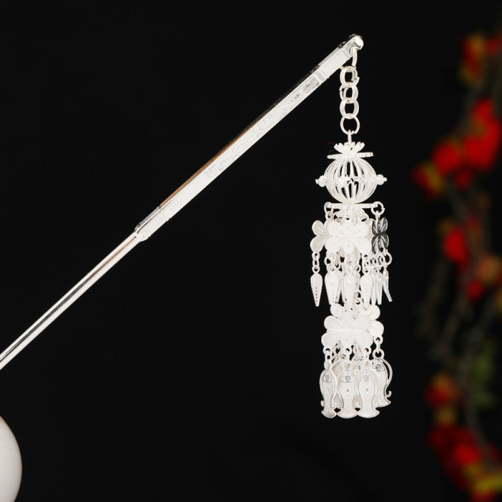 Boho vintage ethnic silver-tone hair stick featuring detailed textured handle, intricate chain network decor, and layered silver tassel pendants, displayed against a black background with red floral accents 18