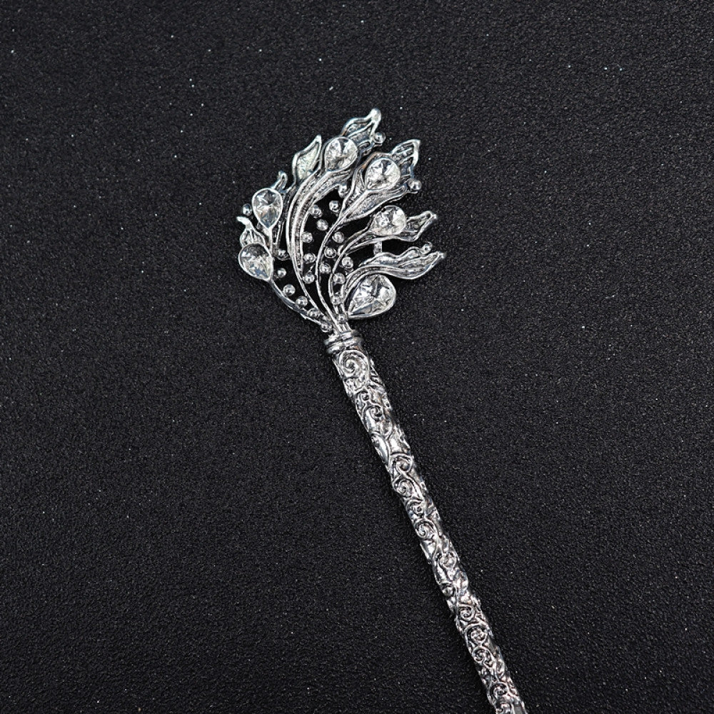 Boho vintage ethnic silver tone hair stick featuring a detailed flower cluster top and ornate carved pattern handle, displayed on a black glittery fabric background, ideal for bohemian and traditional fashion enthusiasts in the US 01