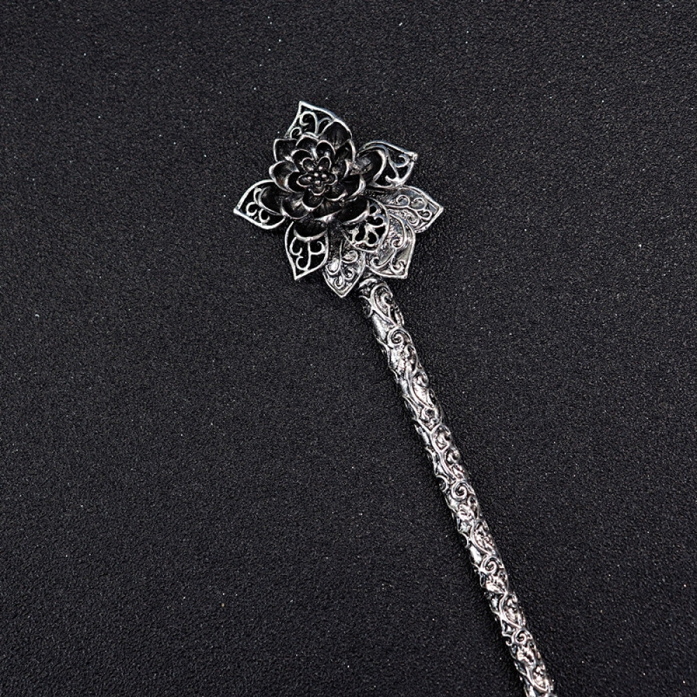 Boho vintage ethnic silver tone hair stick featuring a detailed flower cluster top and ornate carved pattern handle, displayed on a black glittery fabric background, ideal for bohemian and traditional fashion enthusiasts in the US 05