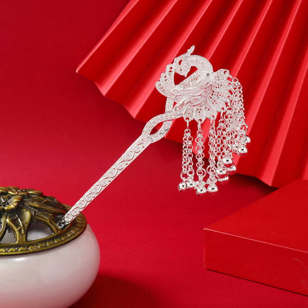 Boho vintage ethnic silver-tone hair stick featuring an elaborate peacock openwork design and layered bell tassel fringe, ideal for bohemian traditional fashion styling in the US