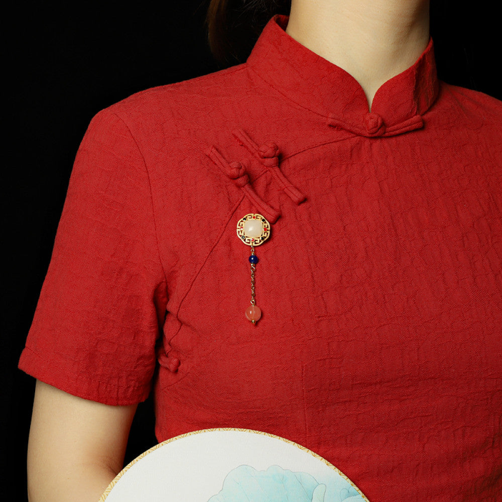 Boho vintage ethnic statement brooch pendant featuring white gemstone, red accents and colorful bead tassel, styled on a wooden tray, ideal for bohemian and traditional fashion enthusiasts in the US 02