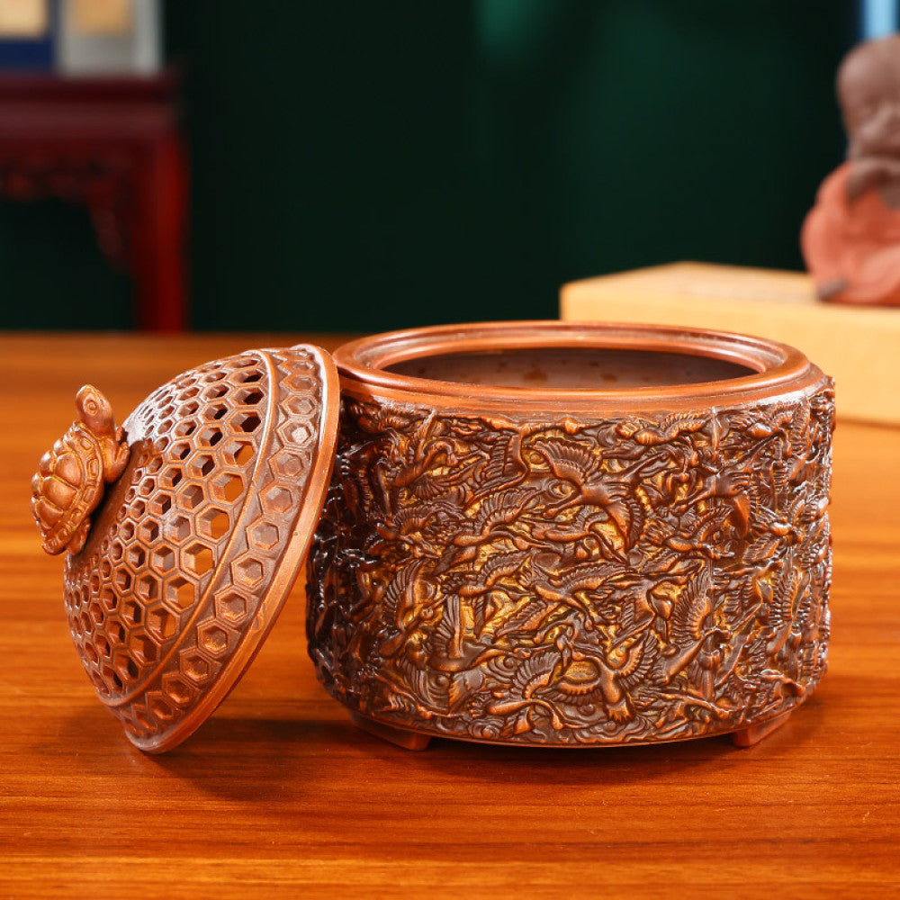 Intricate bronze Chinese incense burner with a tortoise-topped pierced lid and elaborate crane carvings, a Feng Shui symbol of longevity and wealth, displayed as a unique home decor piece against a white background 03