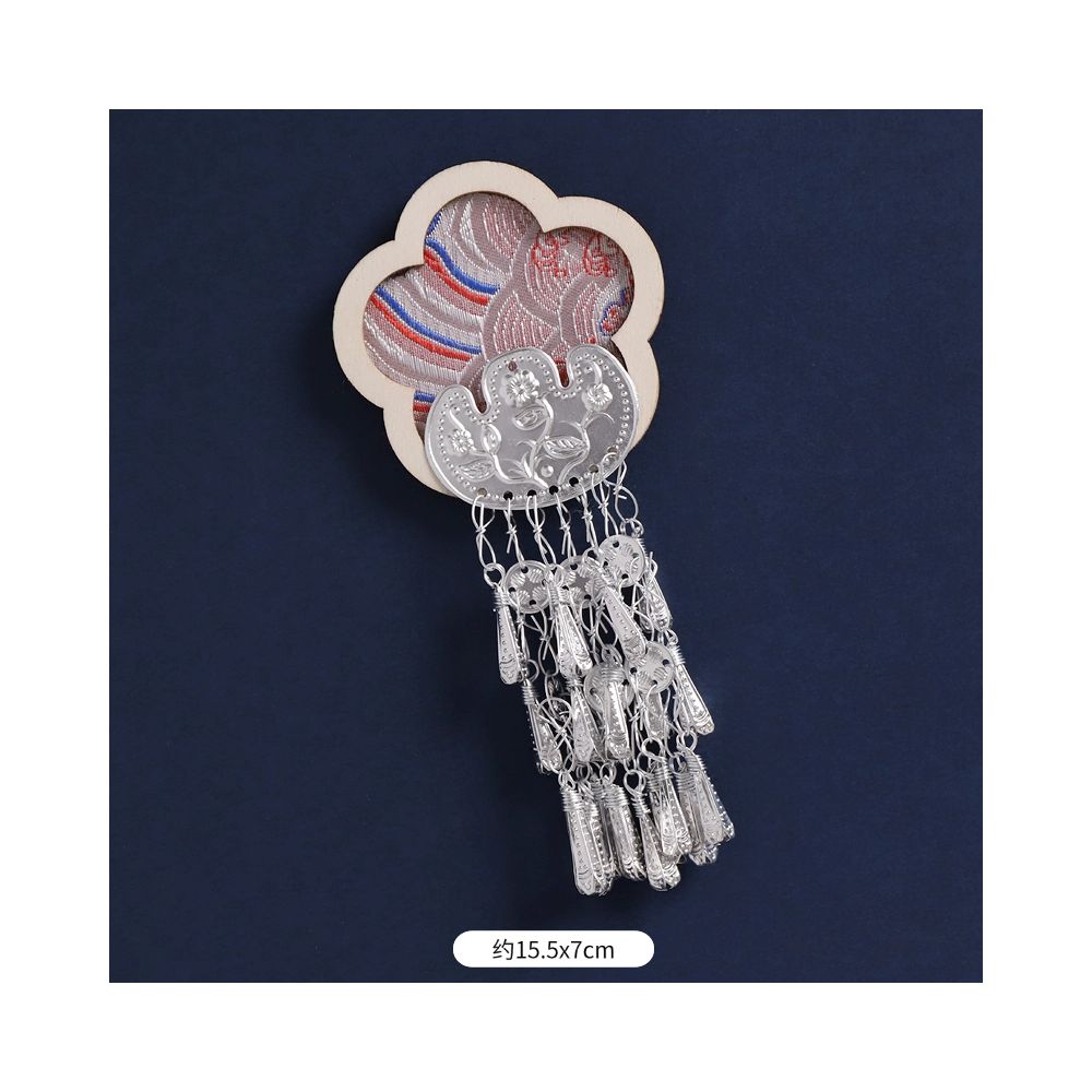 Burgundy floral magnet with dangling silver ornaments.