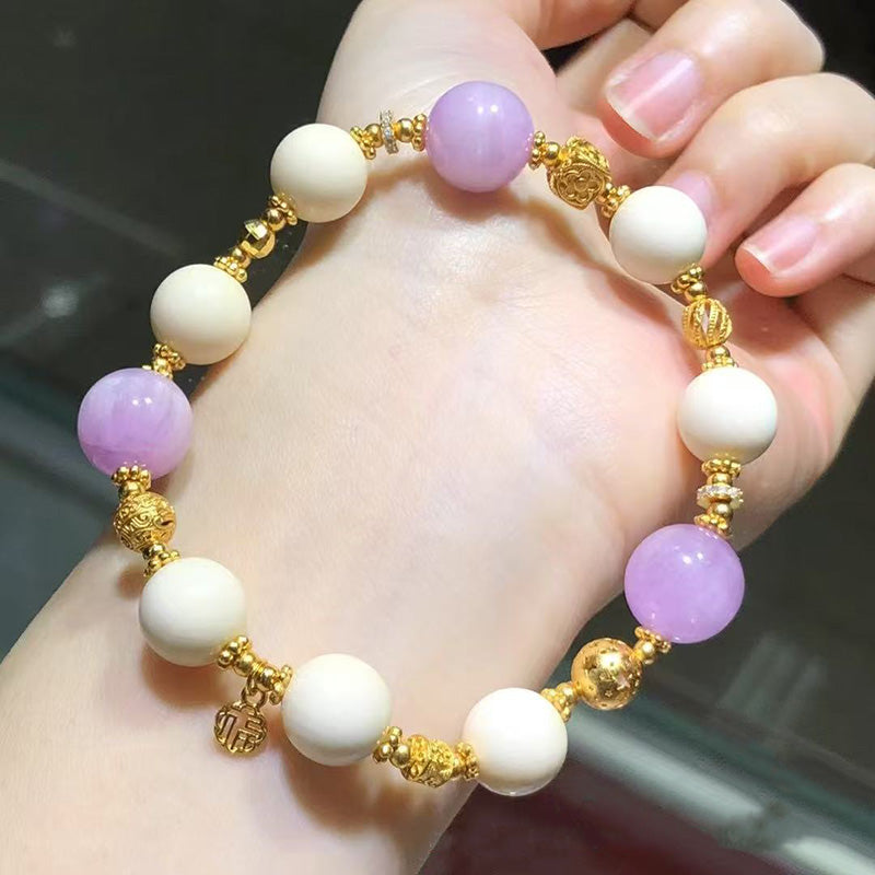 Handmade bracelet with lavender jade beads, white beads and gold - toned embellishments 01