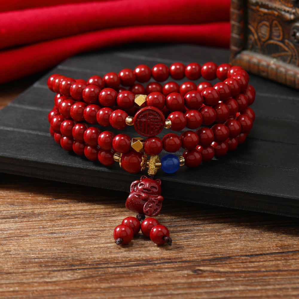 Multicolor beads with cinnabar, handcrafted knot details, unique.