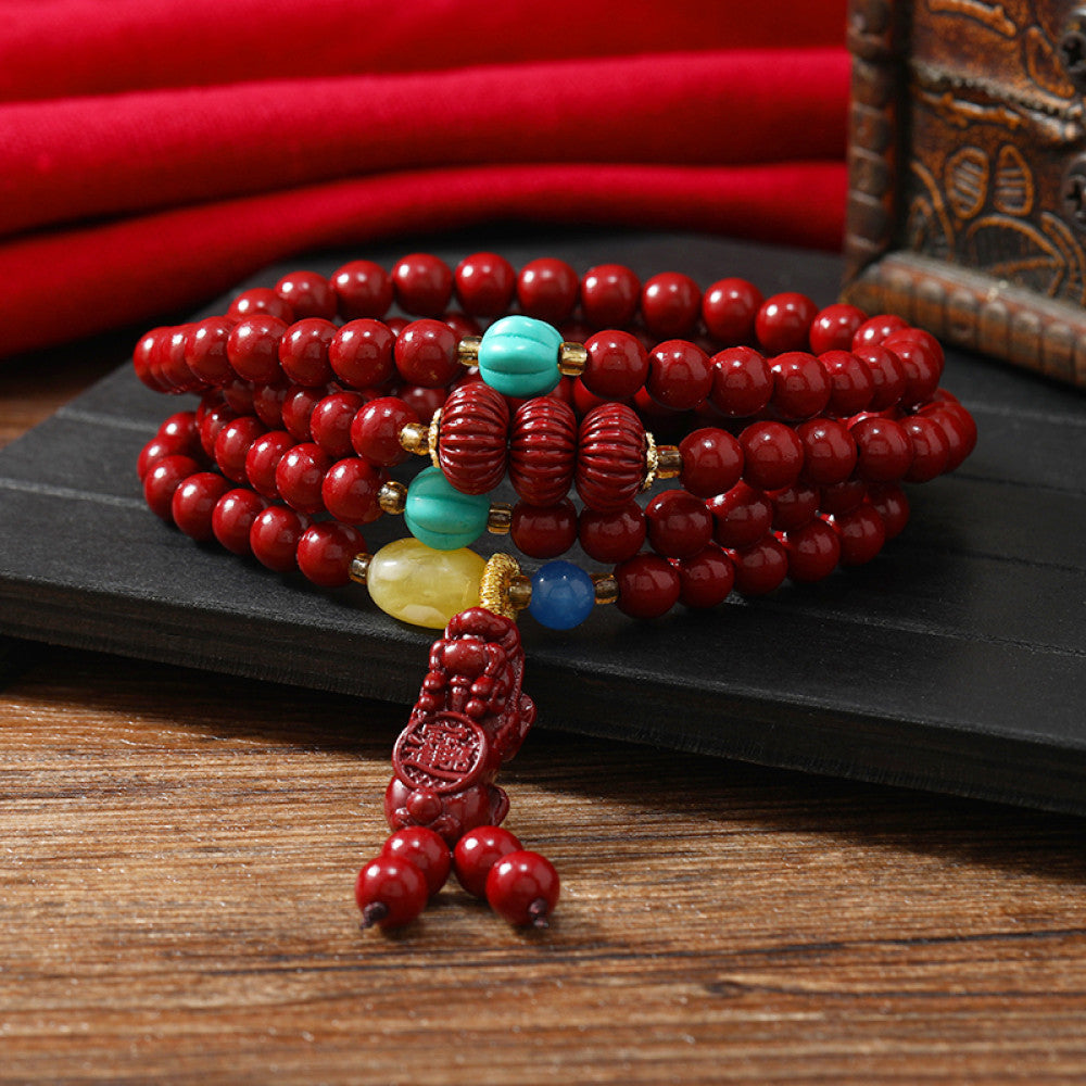 Cinnabar with pink quartz accents, soft and charming for daily wear.