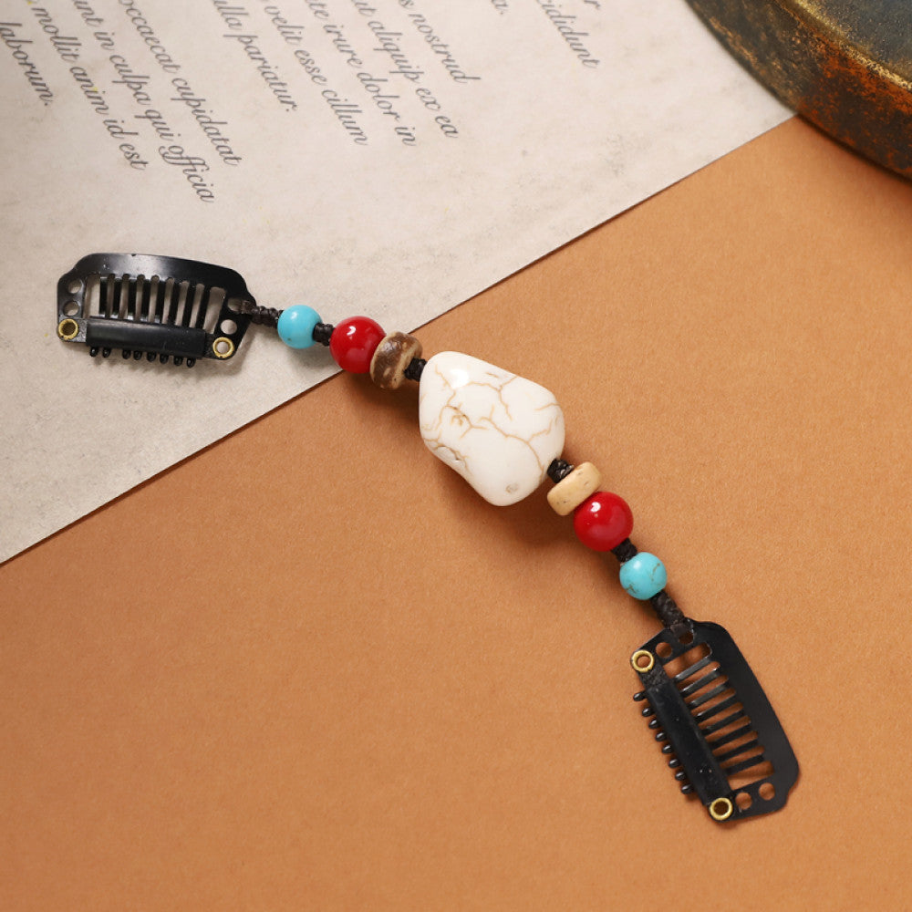 Boho vintage ethnic double hair comb ornament featuring an evil eye decorative bead, red/yellow beads, and black hair combs 02