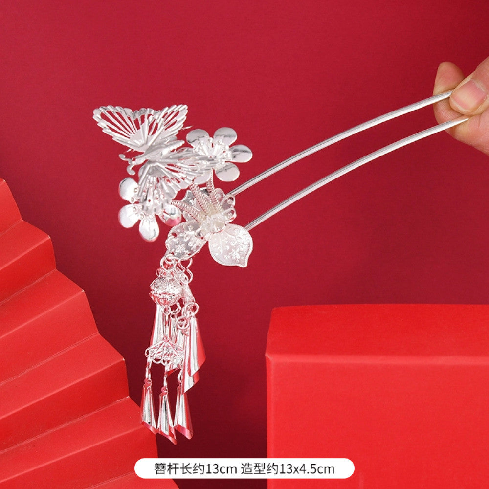 silver-tone hair stick featuring intricate openwork details and layered tassel fringe 03