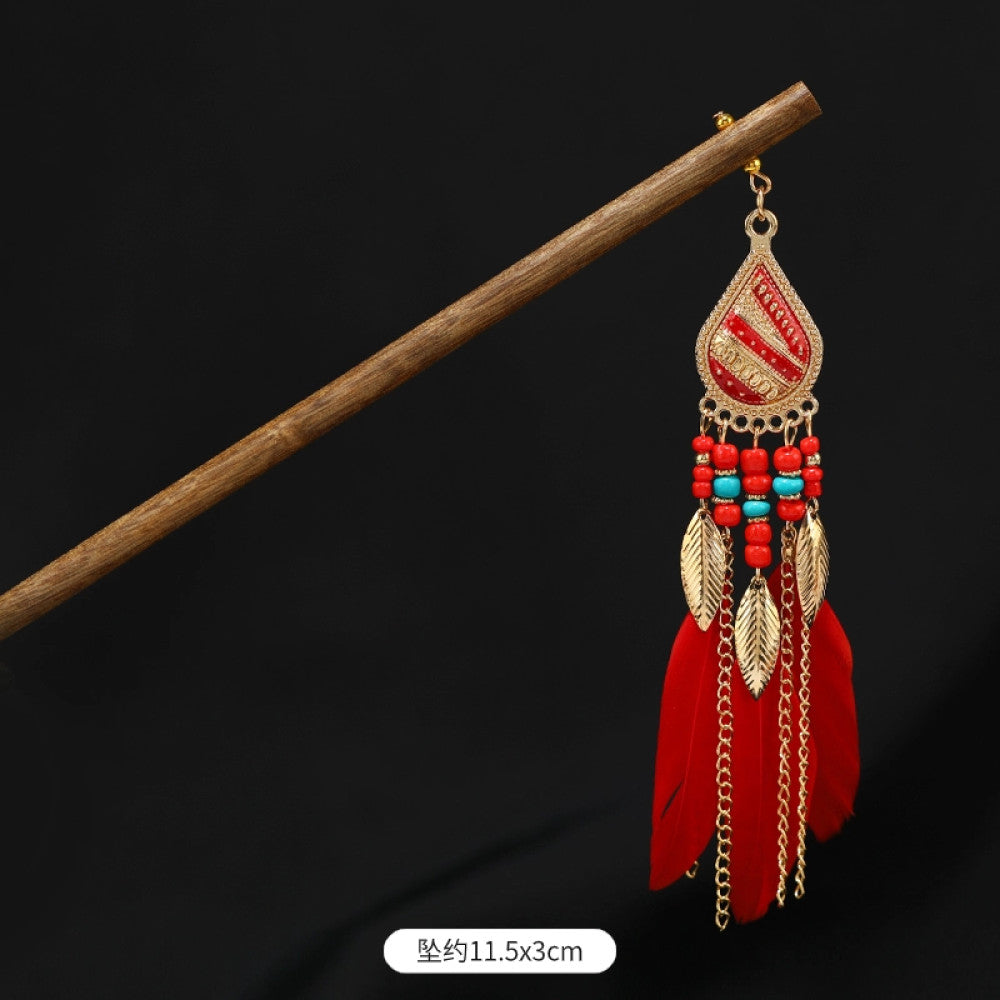Boho vintage ethnic wooden hair stick featuring colorful bead accents, an ethnic style decorative plaque, and multi-color feather tassels  displayed against a black background