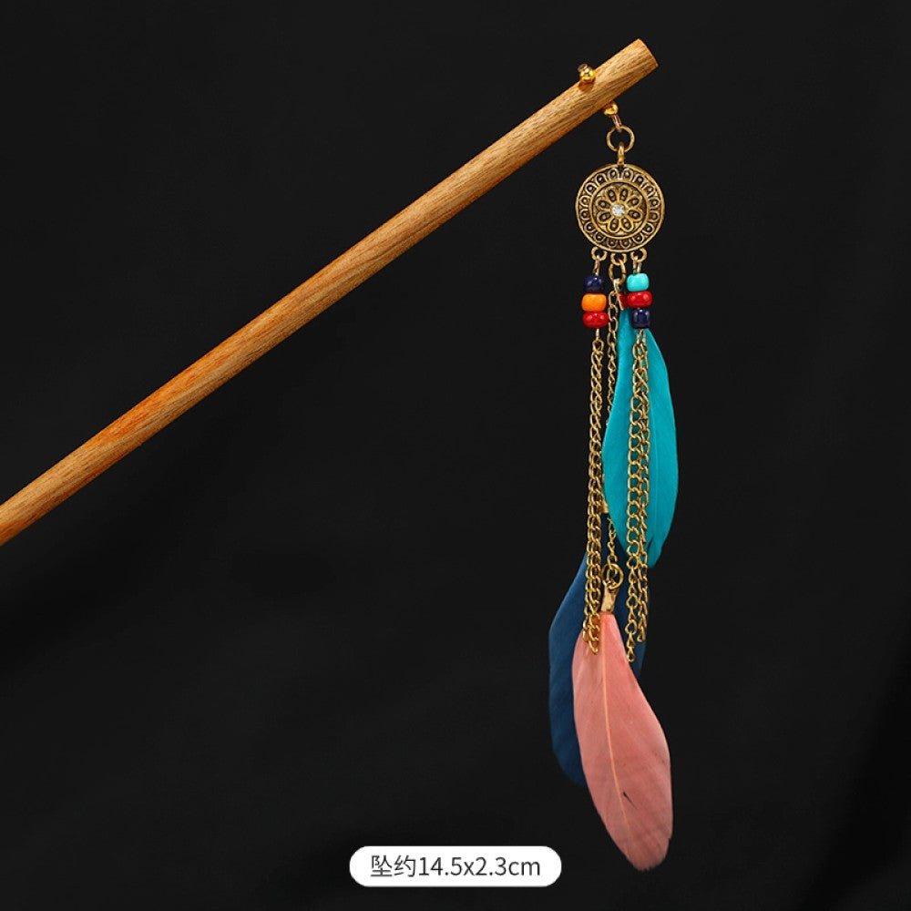 Boho vintage ethnic wooden hair stick featuring colorful bead accents, an ethnic style decorative plaque, and multi-color feather tassels  displayed against a black background 01