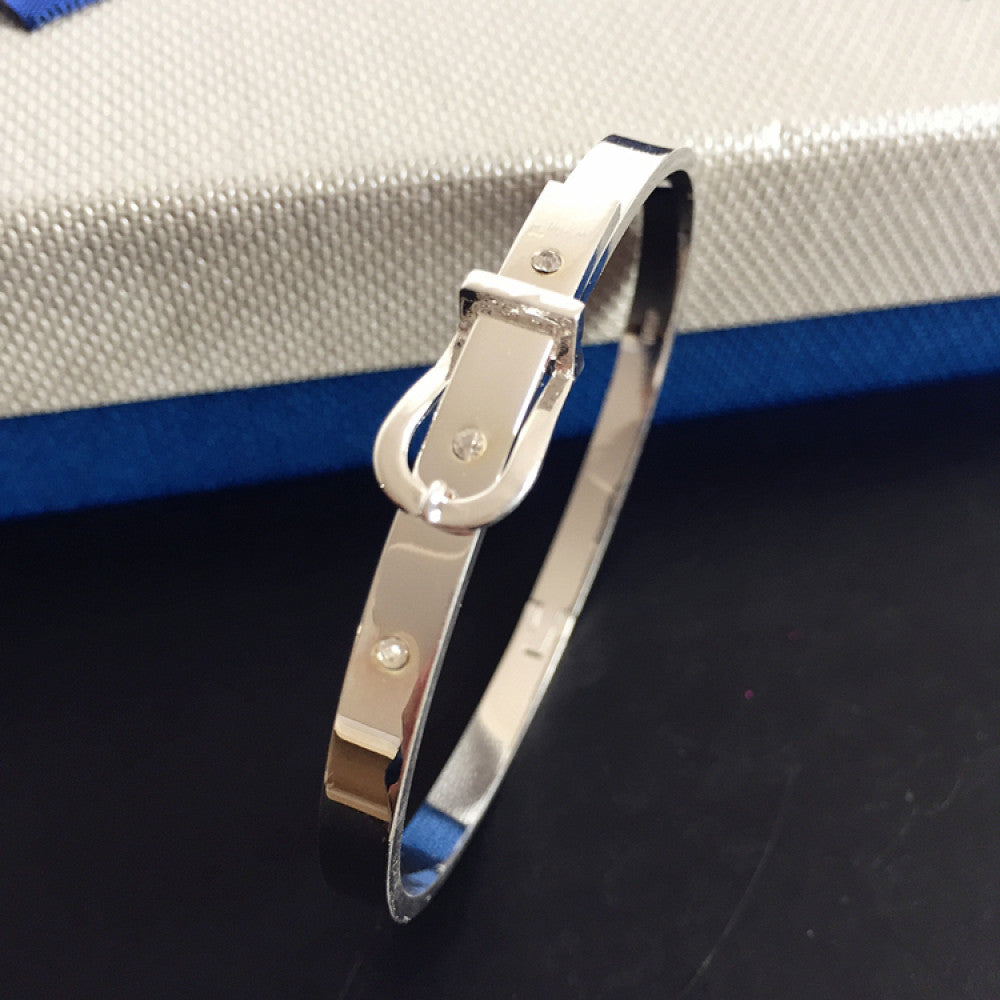 Fashion luxury rose gold bangle with diamond-encrusted buckle, styled with a gift box, ideal for elegant fashion enthusiasts in the US 01