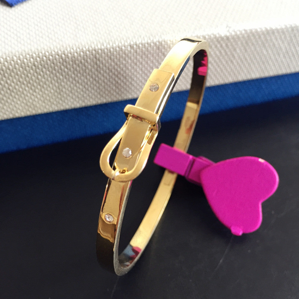 Fashion luxury rose gold bangle with diamond-encrusted buckle, styled with a gift box, ideal for elegant fashion enthusiasts in the US 02