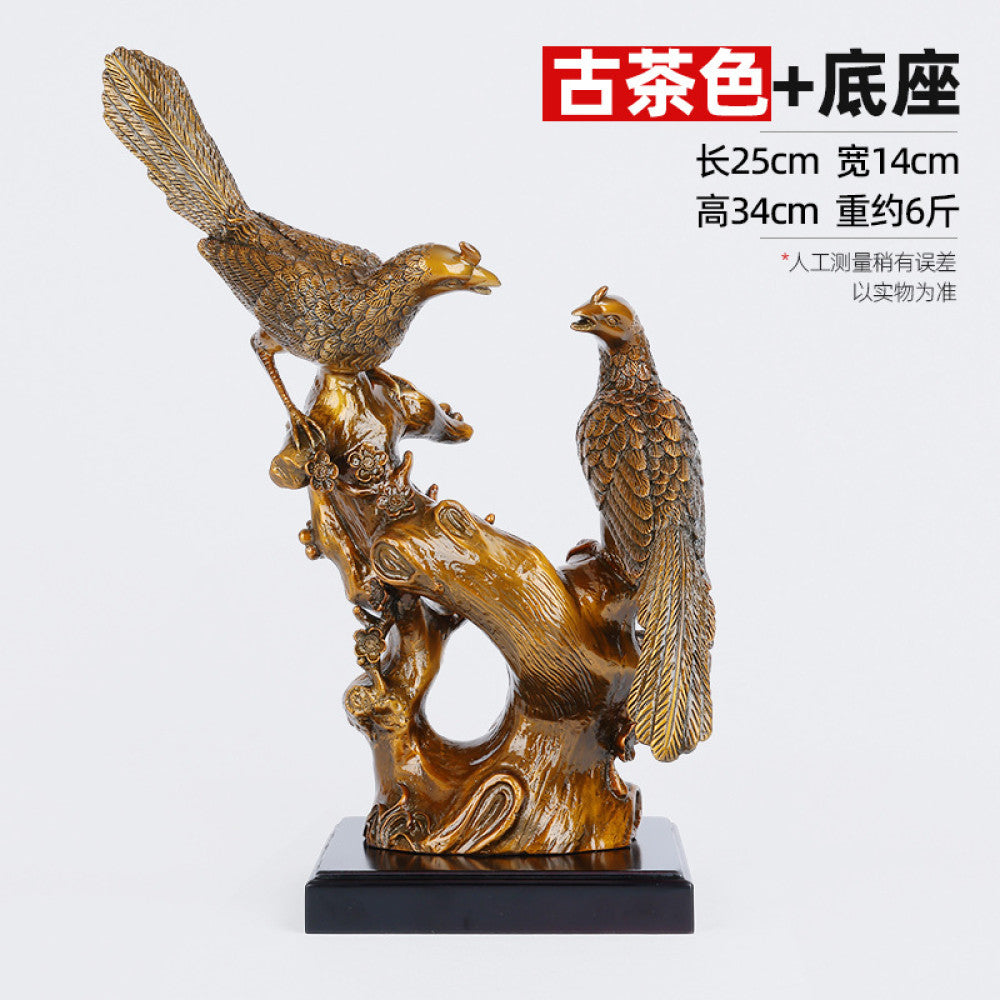 Two colorful birds statue with intricate details, placed on a red branch - shaped base, set against a traditional Chinese octagonal window and red background (with a folding fan), ideal for feng shui home decor 01