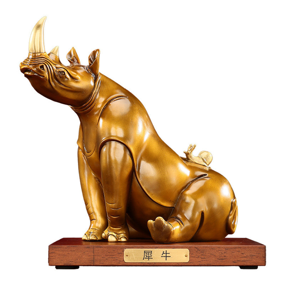 Golden rhino statue with intricate details, a symbol of good luck for home decor, set against a red background 06
