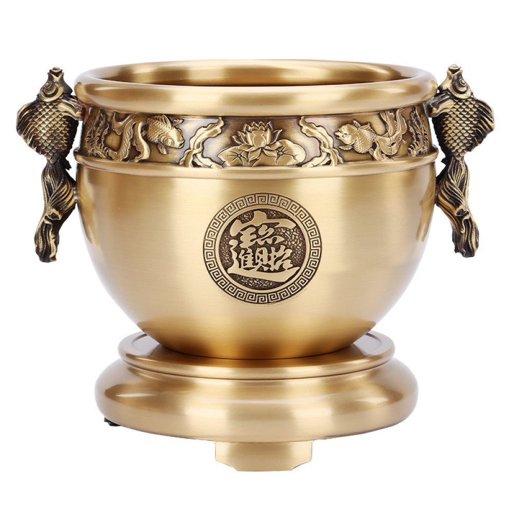 Polished golden bronze Chinese incense burner with fish-shaped handles, intricate lotus and fish carvings, and “Wealth & Prosperity” motif, a Feng Shui symbol of good fortune, displayed as elegant home decor against a white background