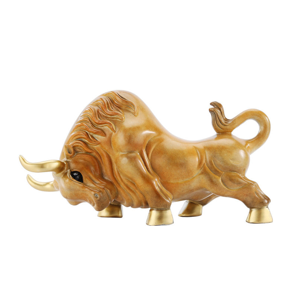 Golden bull statue with detailed craftsmanship, a symbol of strength and good fortune in Feng Shui, displayed as elegant home decor against a red background 04