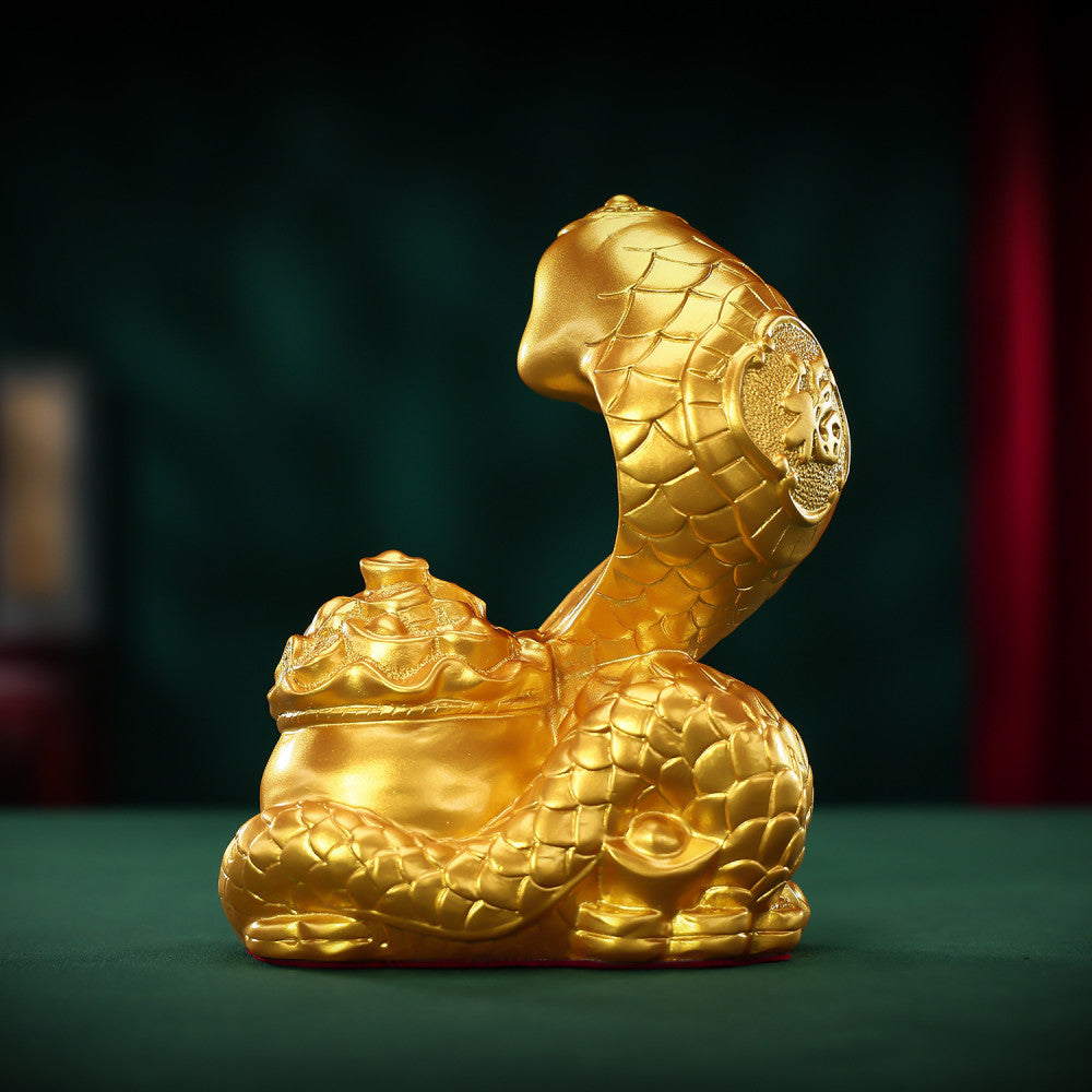 Golden snake statue coiled around a treasure pot, a Feng Shui symbol of good fortune, crafted as stylish home decor against a dark green background 02
