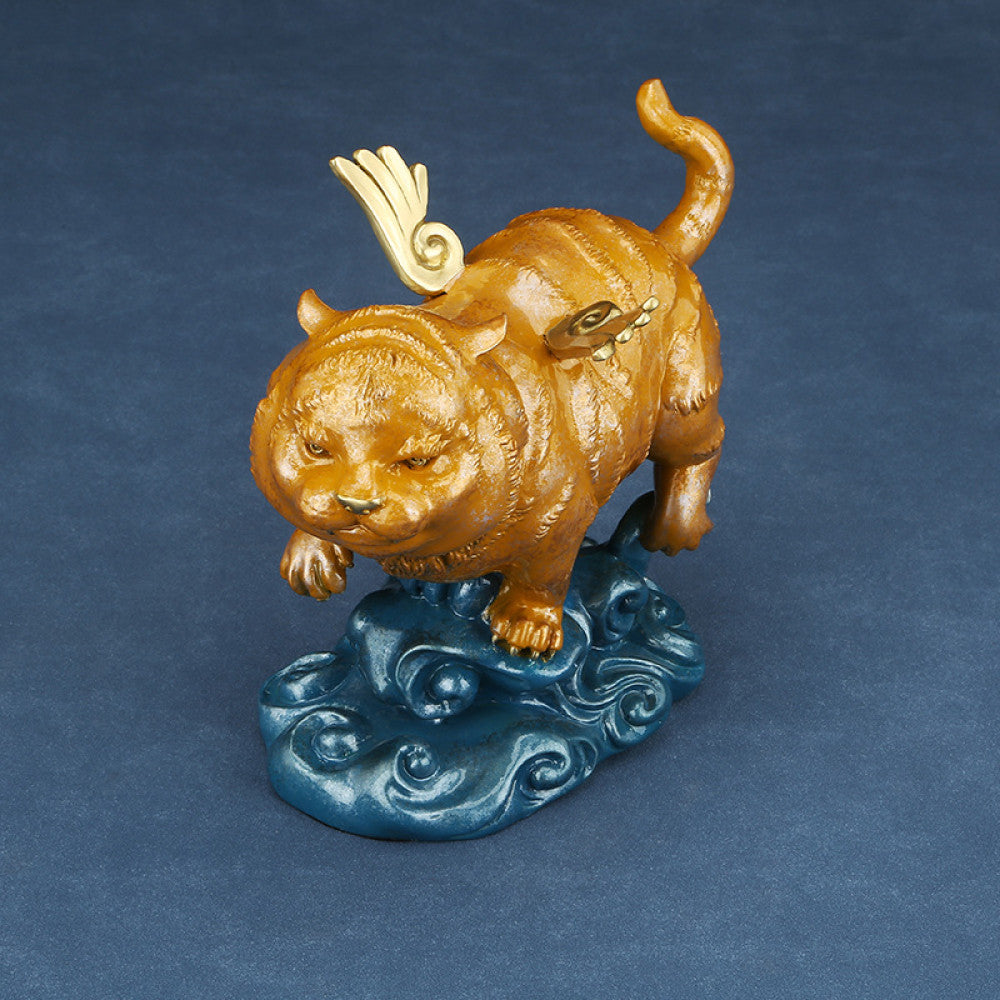 Golden winged tiger statue with blue cloud base, a Feng Shui symbol of strength and good fortune, displayed as elegant home decor against a dark background 03
