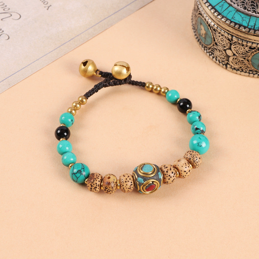 Vibrant turquoise beads dotted with red, fresh and eye-catching.
