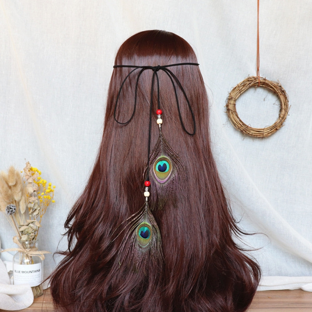 hair band featuring abundant white feather tassels, wooden bead accents, displayed with dried flower vase woven wreath decor