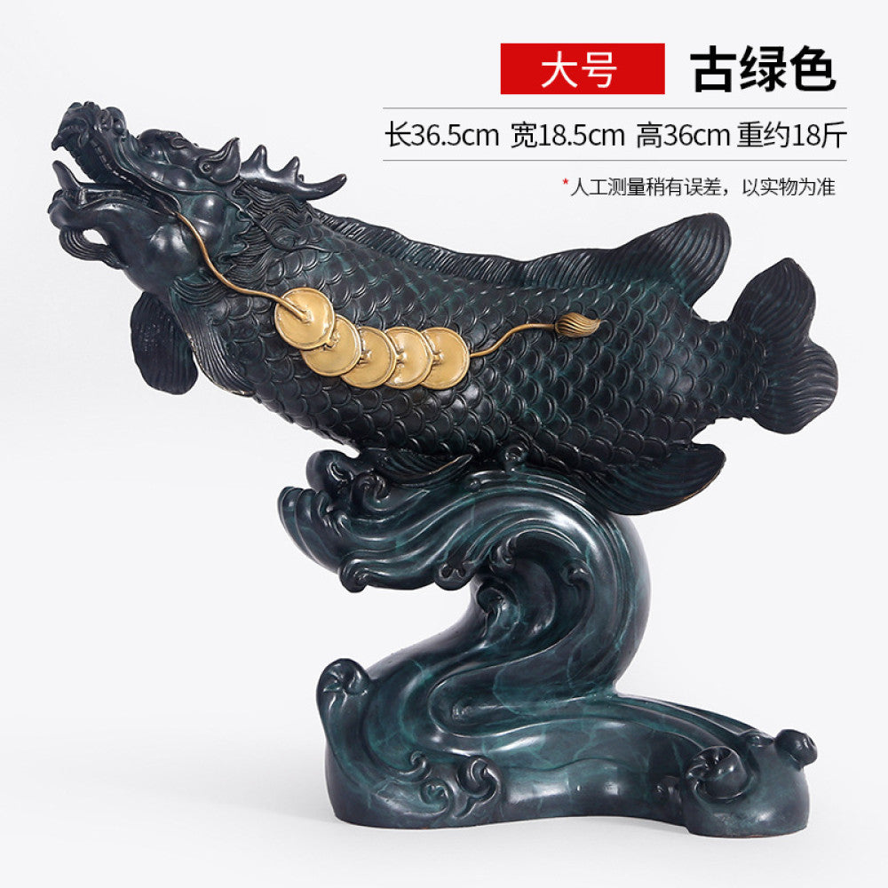 Large traditional Chinese verdigris dragon fish sculpture adorned with lucky coins, placed on a wave - shaped base against a white background