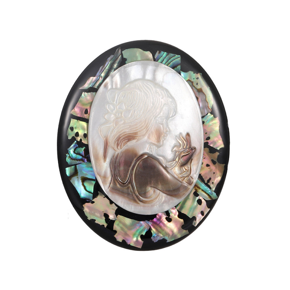 This elegant butterfly brooch is handcrafted from natural mother-of-pearl and iridescent abalone shell, showcasing unique organic patterns. A perfect nature-inspired accessory to elevate any outfit 00