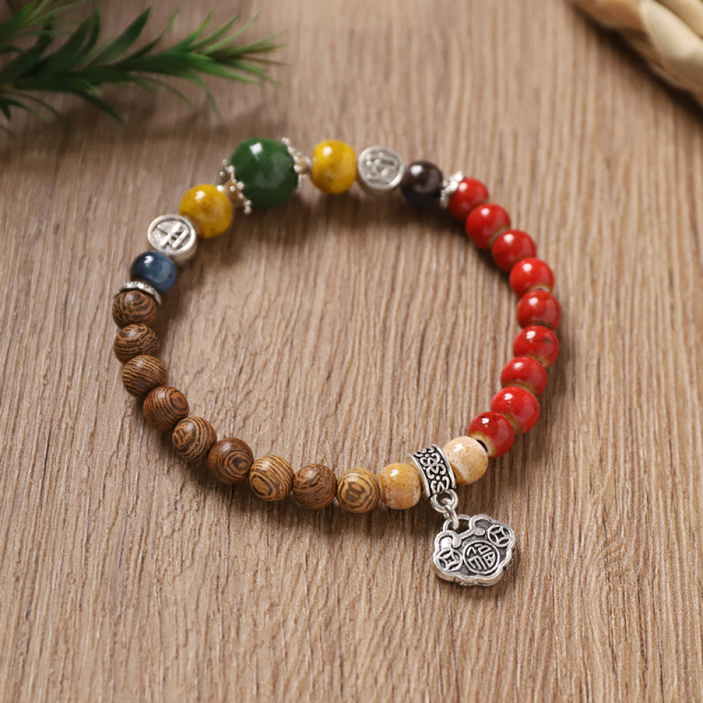 Warm red and brown beads with a yellow accent, cozy and rustic.