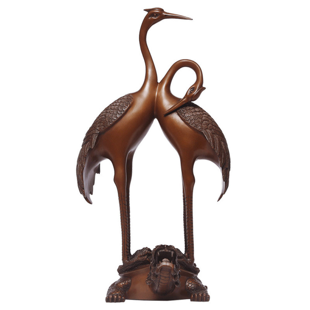 Traditional Chinese bronze crane pair statue with intertwined necks, standing on a dragon turtle base against a dark blue curtain background 02