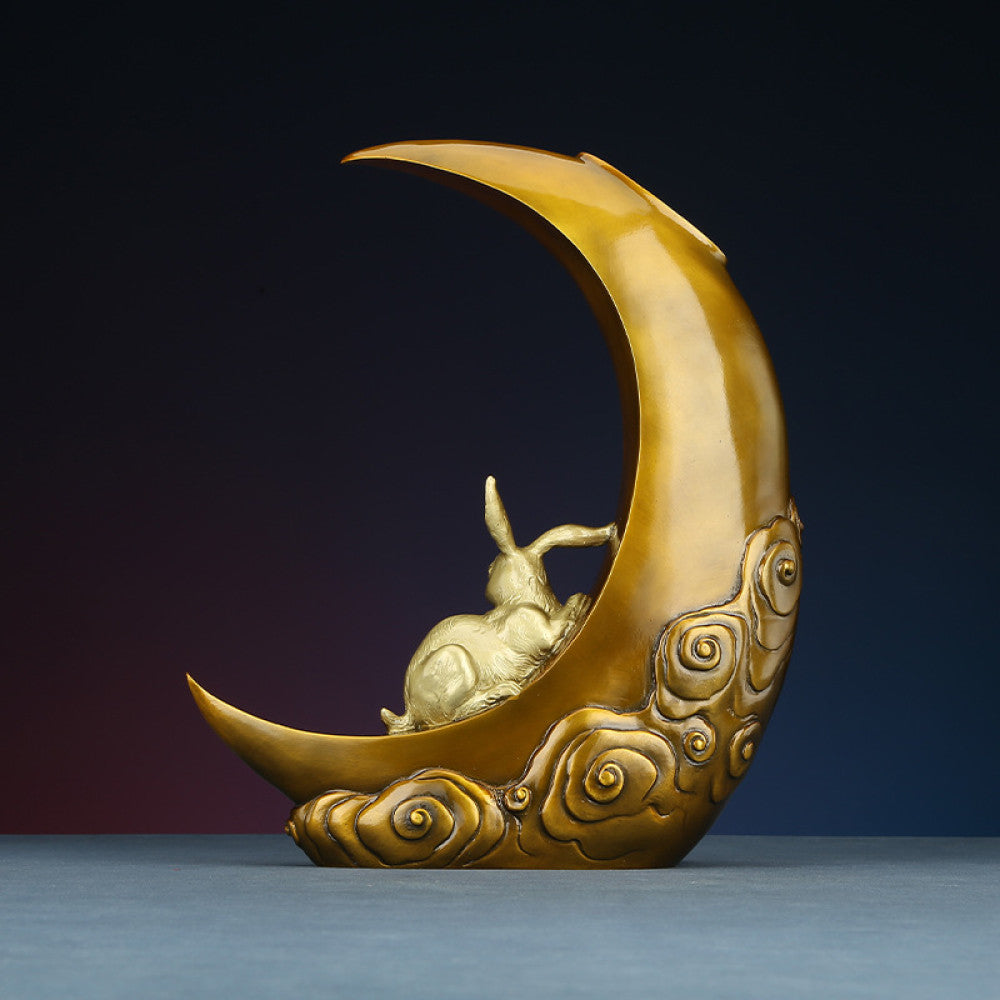 Traditional Chinese bronze sculpture of a crescent moon with a rabbit and cloud patterns, placed against a dark gradient background 02