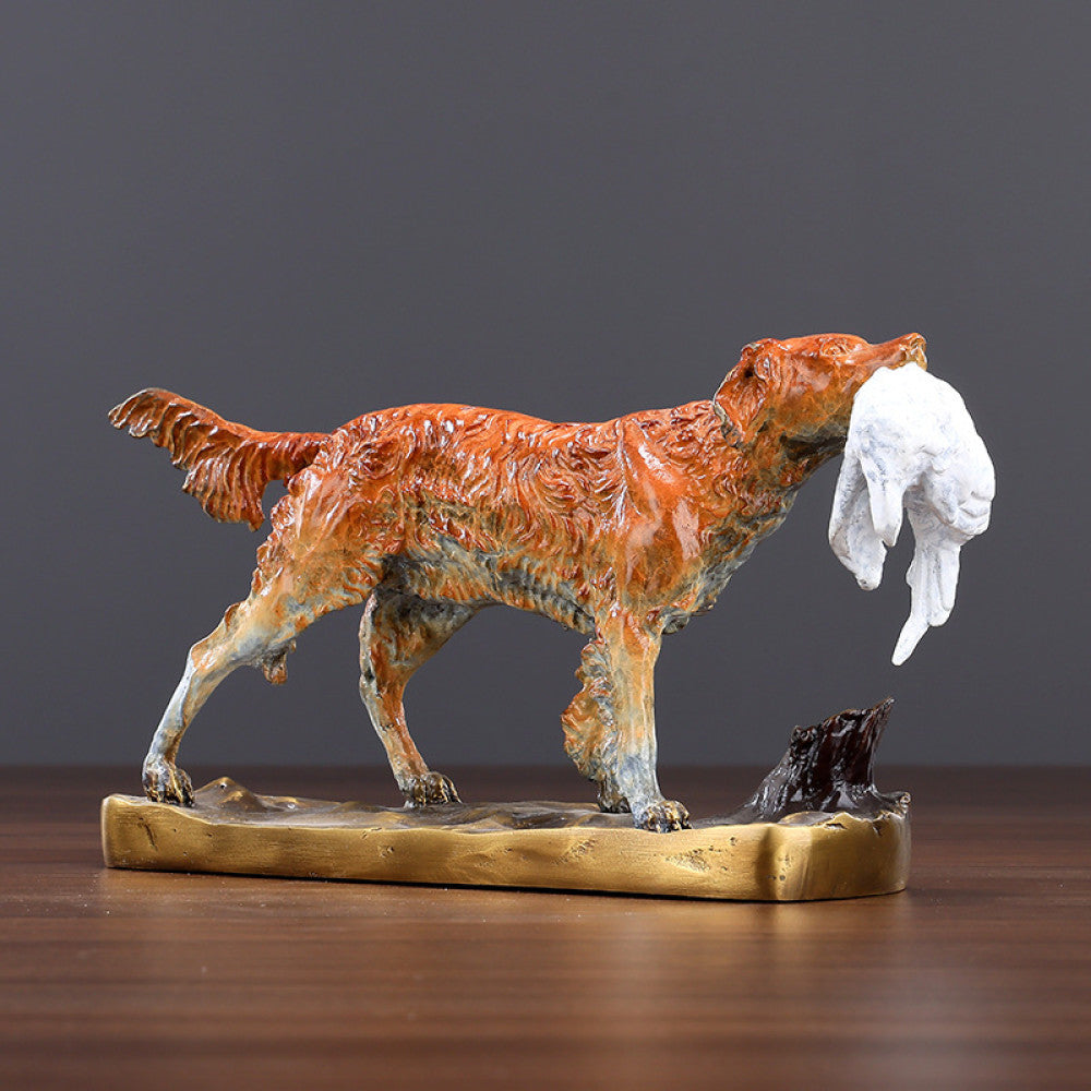 Traditional Chinese bronze dog statue holding a white cloth in its mouth, standing on a golden base against a gray background 02