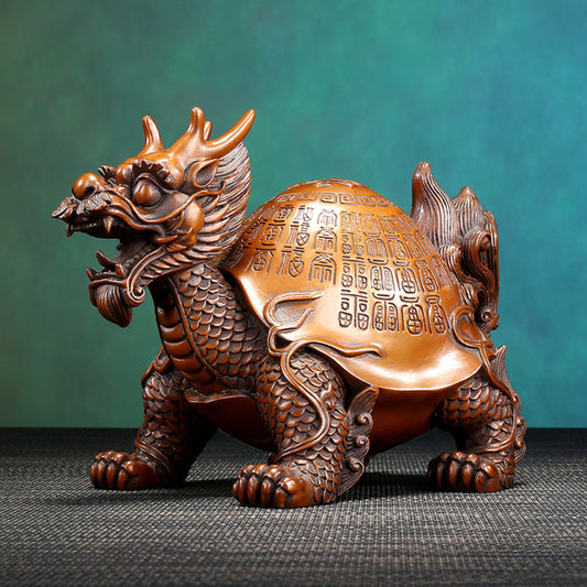Traditional Chinese bronze dragon turtle statue with intricate inscriptions on its shell, displayed against a teal gradient background