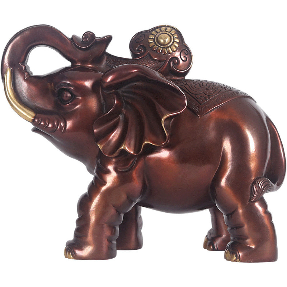 Traditional Chinese bronze elephant statue with golden details, curled trunk, and auspicious design on back, placed on a wooden base against a dark blue gradient background 01