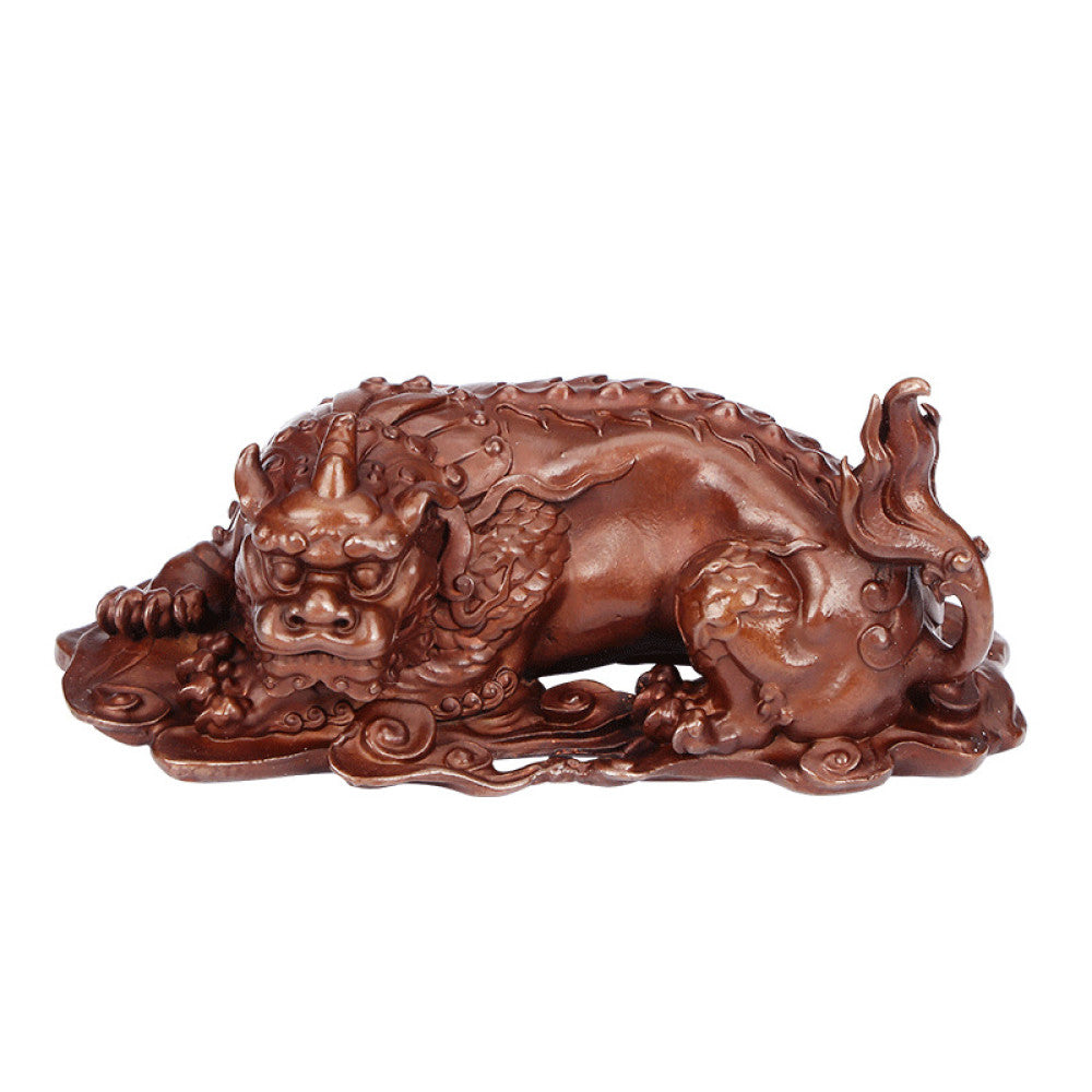 Traditional Chinese bronze mythical beast statue with intricate carvings, placed on a wooden surface against an ornate golden background 02