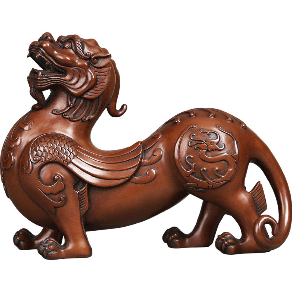 Traditional Chinese bronze Pixiu statue with intricate floral carvings, displayed against a dark blue background 02