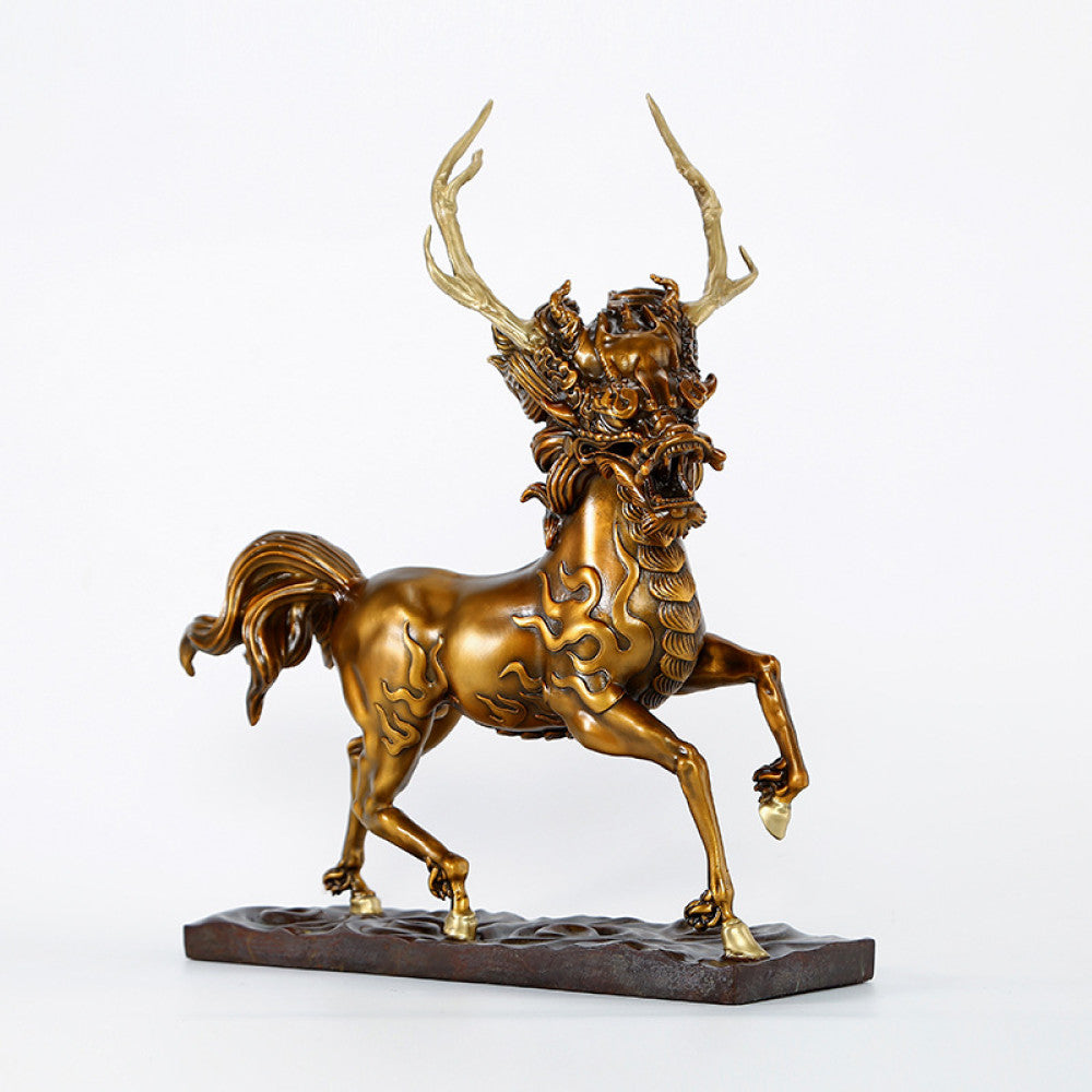 Golden traditional Chinese bronze Qilin sculpture with deer antlers and horse-like form, displayed on a dark base against a white background 01