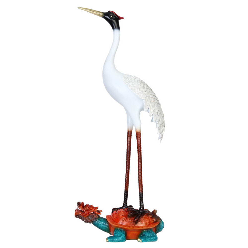 Traditional Chinese crane statue standing on a colorful tortoise, positioned against a dark screen with Chinese lattice pattern and bamboo in the background 01