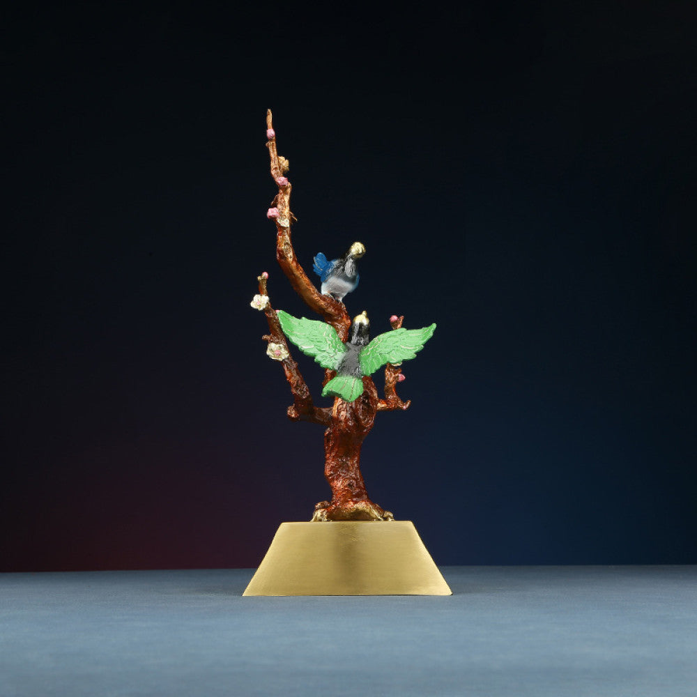 Traditional Chinese enameled sculpture of colorful birds on a flowering branch, placed on a golden base against a dark background 02