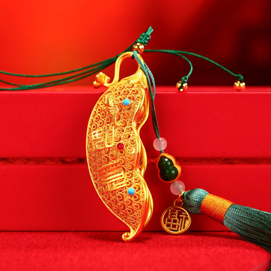 Traditional Chinese gold - plated bean pod pendant with lucky characters, gem inlays, and tassel (featuring "Fu" symbol), isolated on white background 01