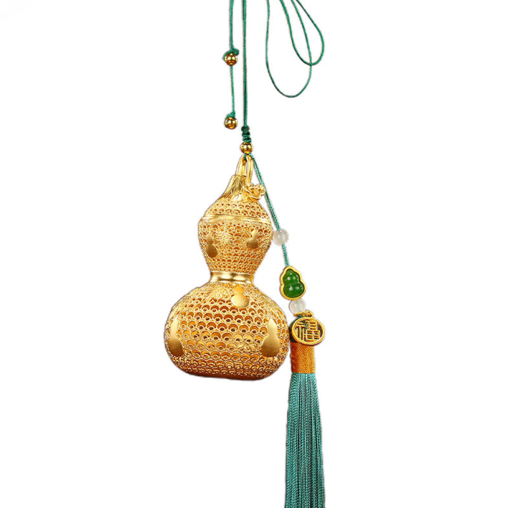Traditional Chinese golden gourd hanging ornament with intricate openwork, tassel, and jade accents, set against a red background with Chinese lattice design 05