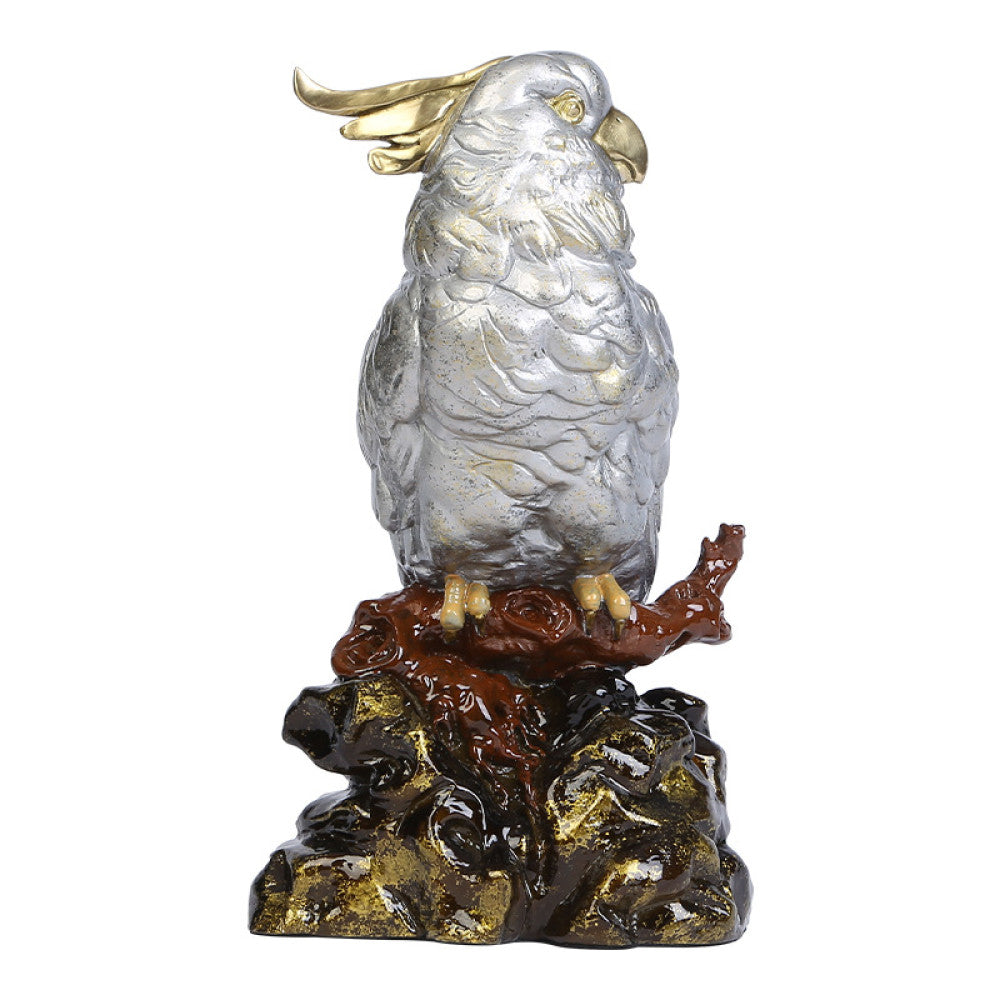 Traditional Chinese silver parrot statue with detailed feathers, perched on a golden - brown rocky base, set against a dark blue curtain and Chinese lattice background 04