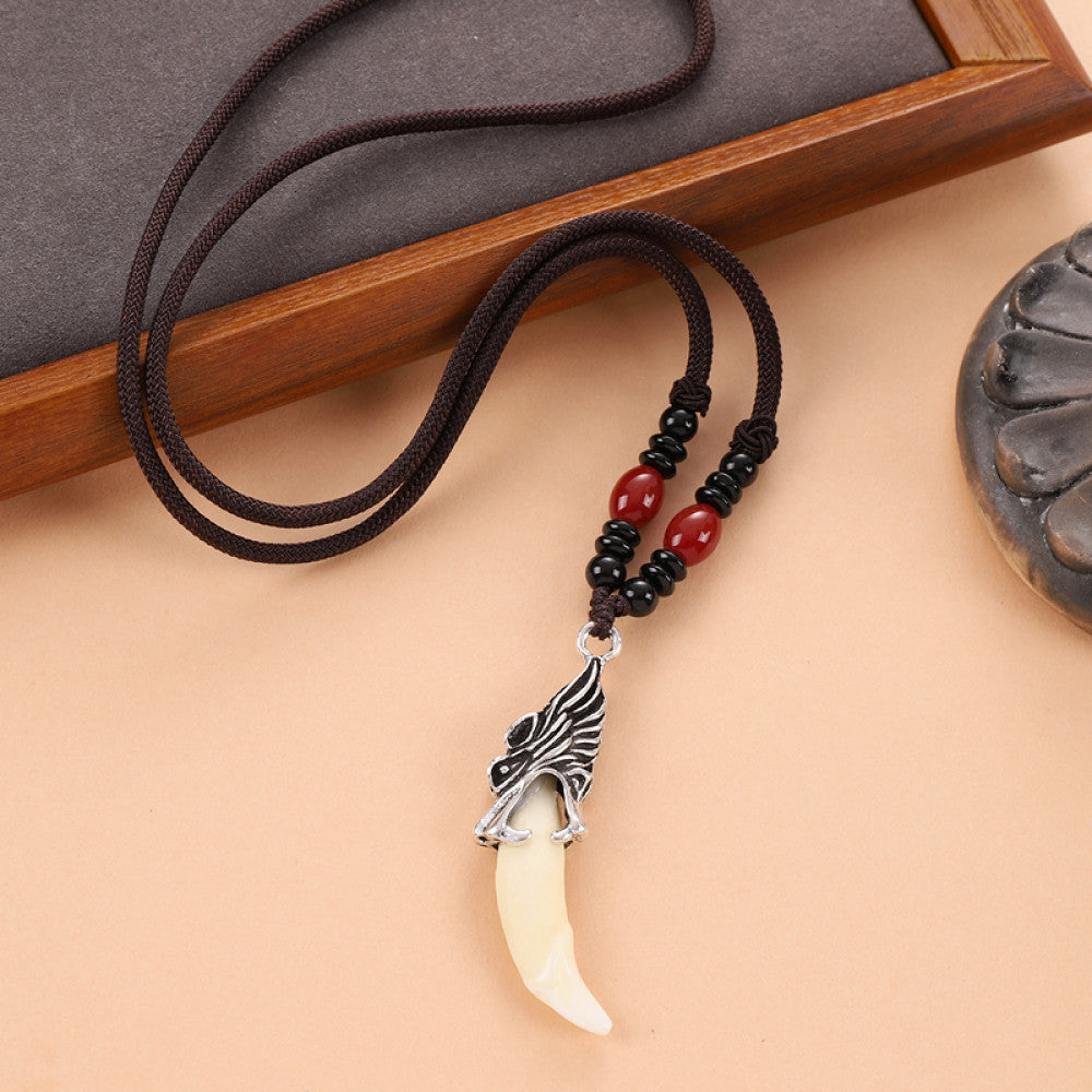 Vintage wolf tooth pendant necklace for men with tribal style metal wolf design and beaded cord 02