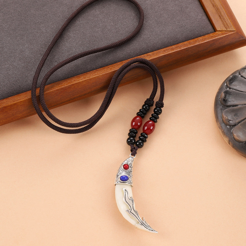 Vintage wolf tooth pendant necklace for men with tribal style metal wolf design and beaded cord 05