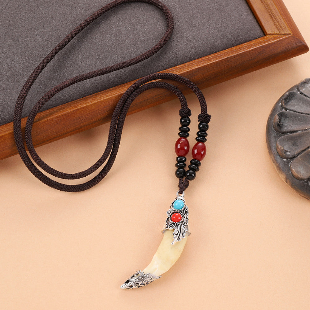 Vintage wolf tooth pendant necklace for men with tribal style metal wolf design and beaded cord 07