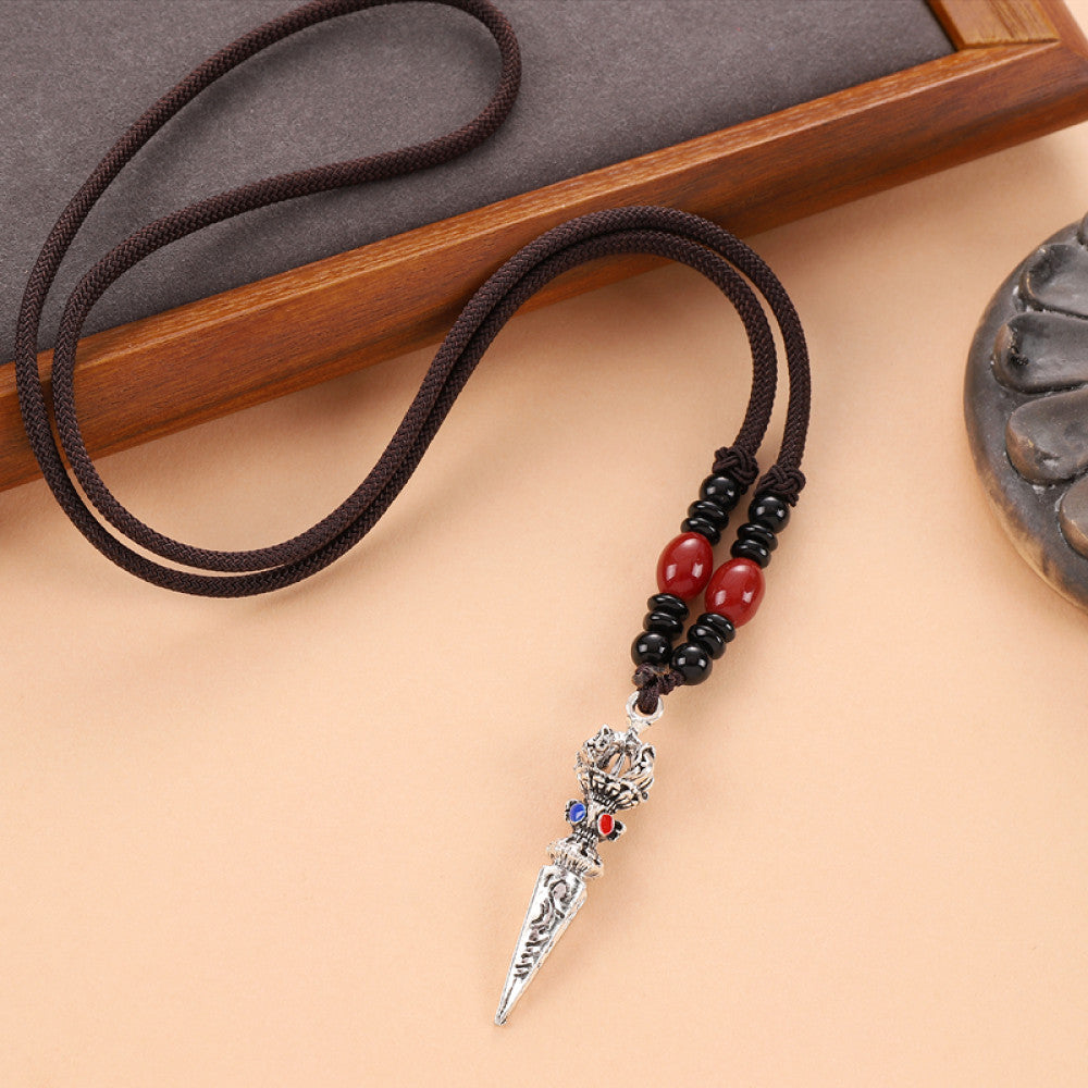 Vintage wolf tooth pendant necklace for men with tribal style metal wolf design and beaded cord 15