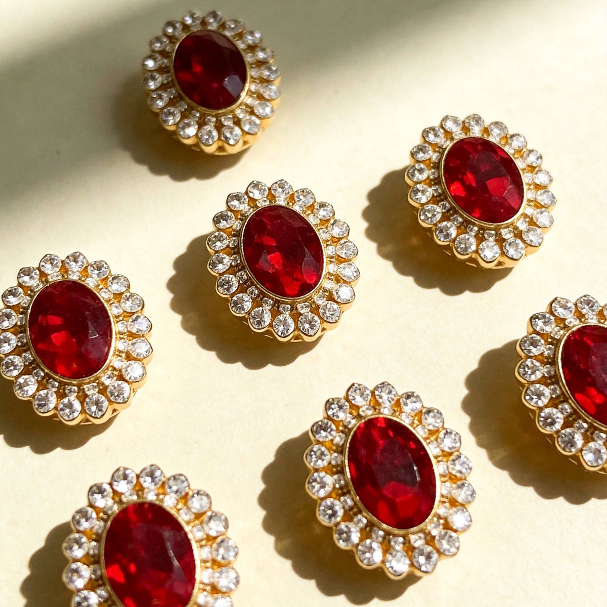 Assembled vintage red gem sunflower‑shaped pet collar charms studio product photo | DIY Jade