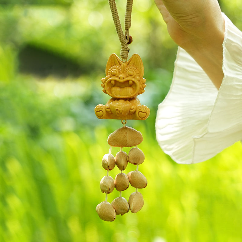 Carved wooden totem top seed pod tassel hanging ornament garden shot | DIY Jade