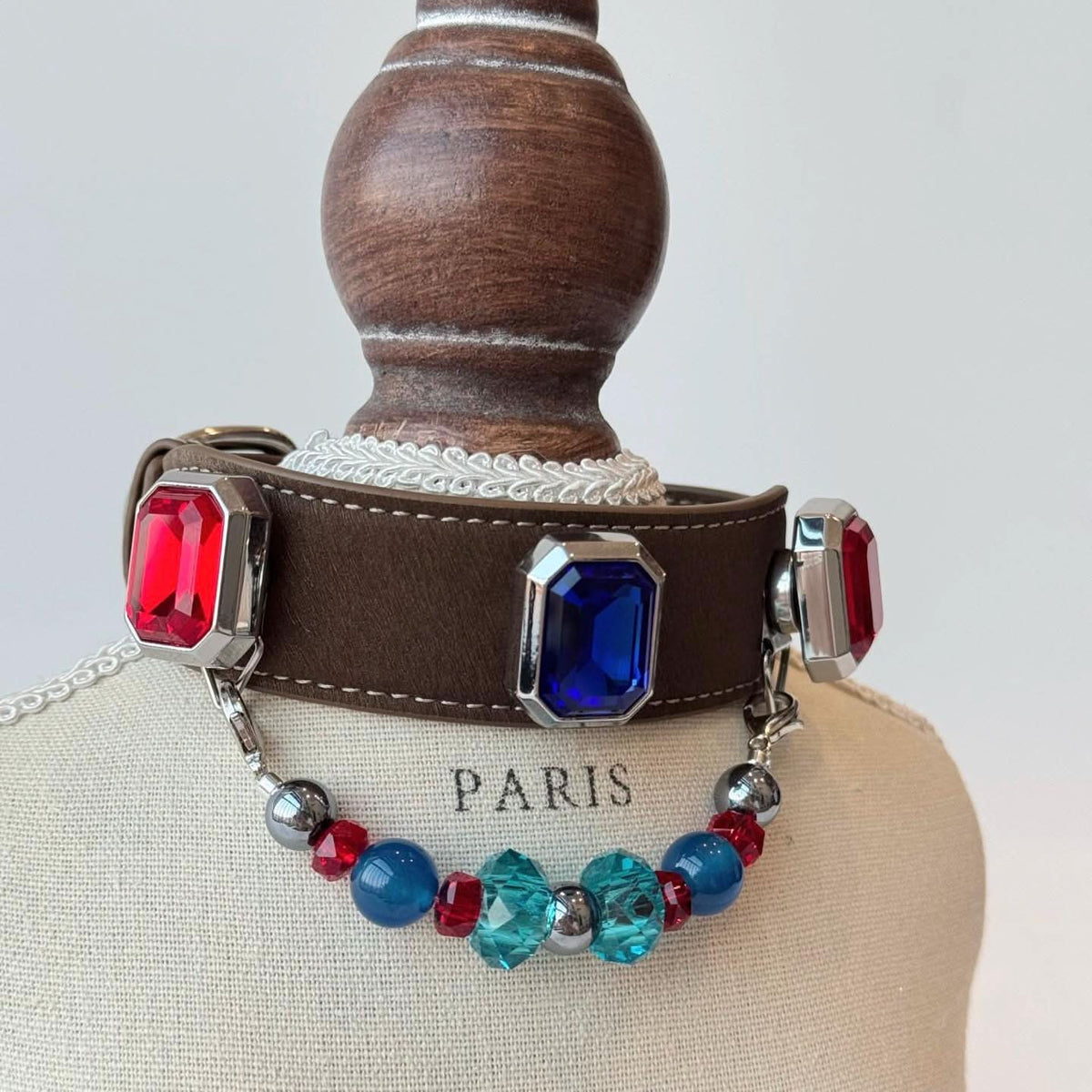 Baroque multi‑colored gem pet collar on wooden mannequin bust | DIY Jade