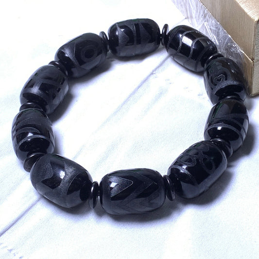 Barrel-shaped black obsidian stretch bracelet, polished natural stone jewelry | DIY Jade